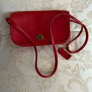 Red Coach crossbody bag.
